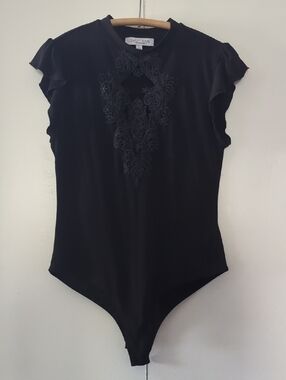 *Black Ruffle-Sleeve Bodysuit